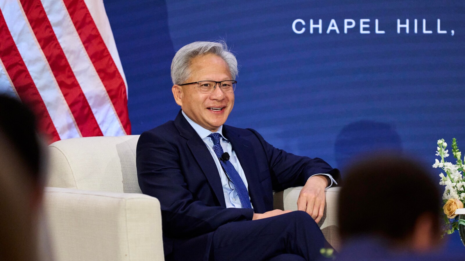 Nvidia CEO Jensen Huang Puts Trump on Speaker at AI Summit
